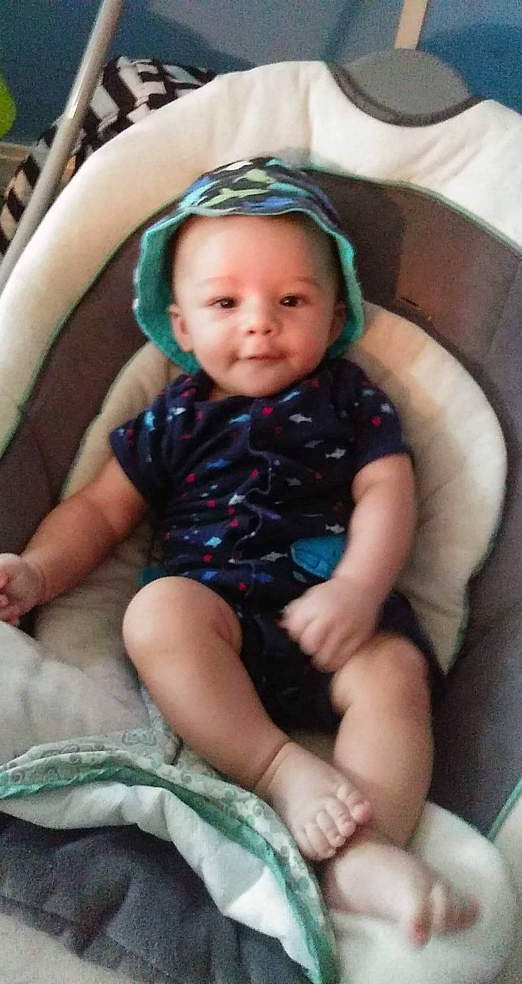 Tay is registered to the contest to win money with this photo: baby, baby_products, child, person, product, sitting, toddler