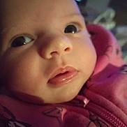 Gabrielle participe au concours pour gagner de l'argent avec cette photo : baby, close_up, face, infant, pink_clothing, eyes, mouth, nose, skin, portrait, child, cute, soft_lighting, expression, newborn, young_child, apparel, indoors, person, clothing