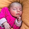 Gabrielle a rejoint le concours — aidez-le/la à gagner de superbes lots ! baby, sleeping, infant, pink_clothing, orange_blanket, soft_texture, hand, face, peaceful, cute, newborn, portrait, closeup, resting, cozy, child, skin, cute_expression, indoors, toddler