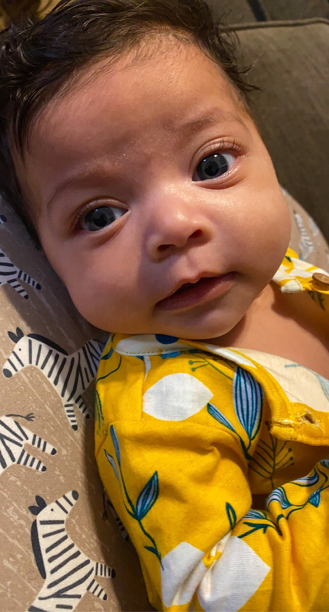 Kamaiyah is registered to the contest to win money with this photo: baby_toddler_clothing, cheek, chin, eye, eyebrow, eyelash, face, facial_expression, forehead, hairstyle, human, iris, lip, mouth, neck, nose, outerwear, person, product, skin