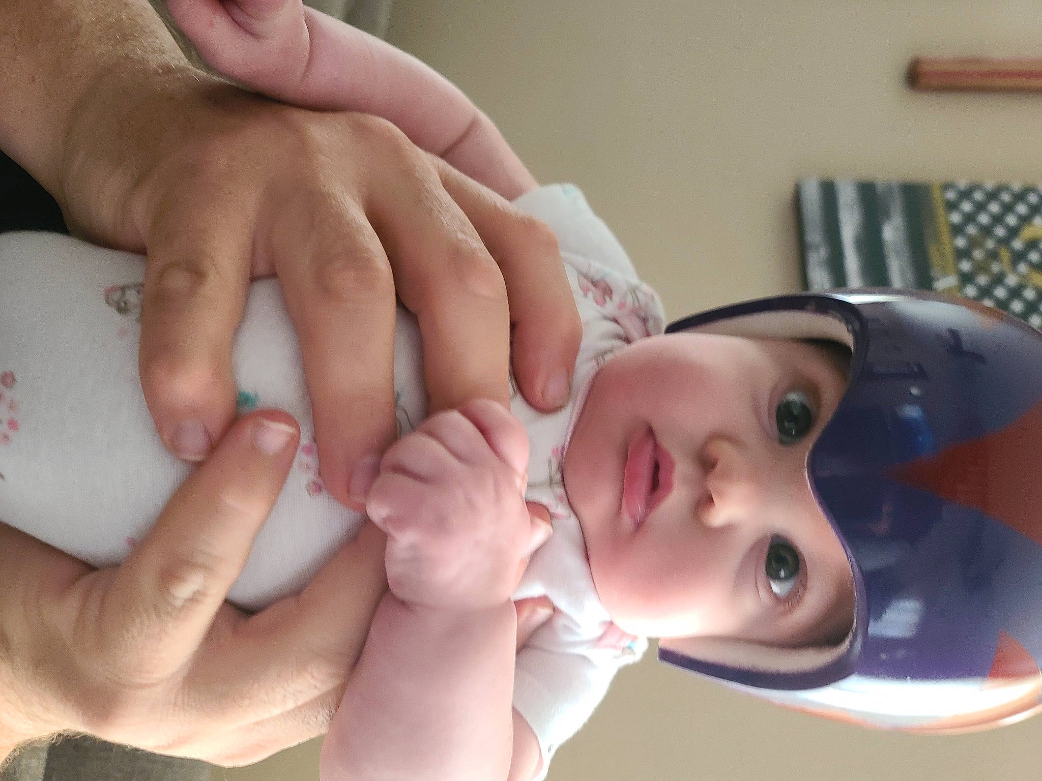 Dixie joined the competition — help win amazing prizes! baby, child, close_up, eyelash, eyewear, finger, gesture, hand, happy, headwear, human_body, lip, mammal, mouth, nail, nose, person, skin, thumb, toddler