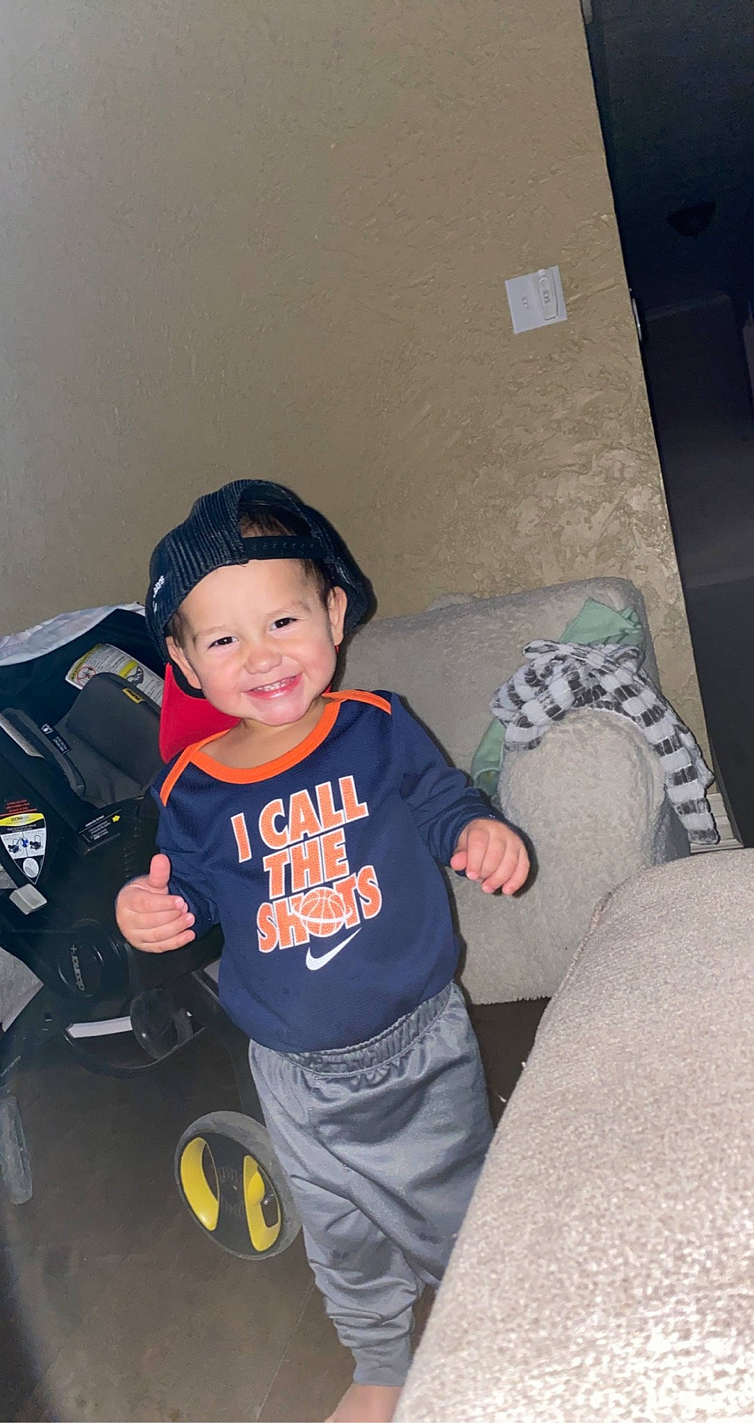 Kolson joined the competition — help win amazing prizes! baseball_cap, chair, child, comfort, cool, couch, electric_blue, flash_photography, flooring, fun, happy, headwear, joy, leg, person, personal_protective_equipment, room, sitting, sleeve, smile