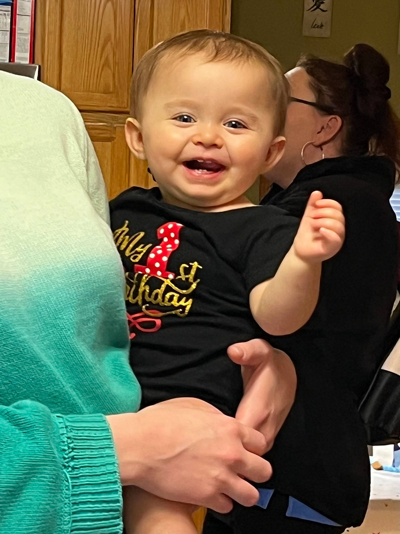 Layla is registered to the contest to win money with this photo: arm, baby, baby_toddler_clothing, cheek, child, comfort, elbow, event, finger, fun, gesture, hand, happy, muscle, person, skin, smile, t_shirt, thigh, thumb