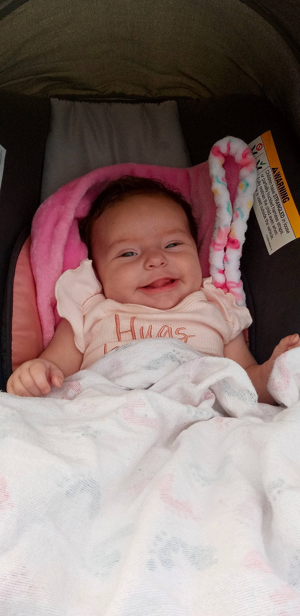 Shiloh joined the competition — help win amazing prizes! baby, baby_toddler_clothing, cheek, child, comfort, facial_expression, finger, happy, human, linens, mammal, nose, organ, person, pink, product, skin, smile, textile, toddler