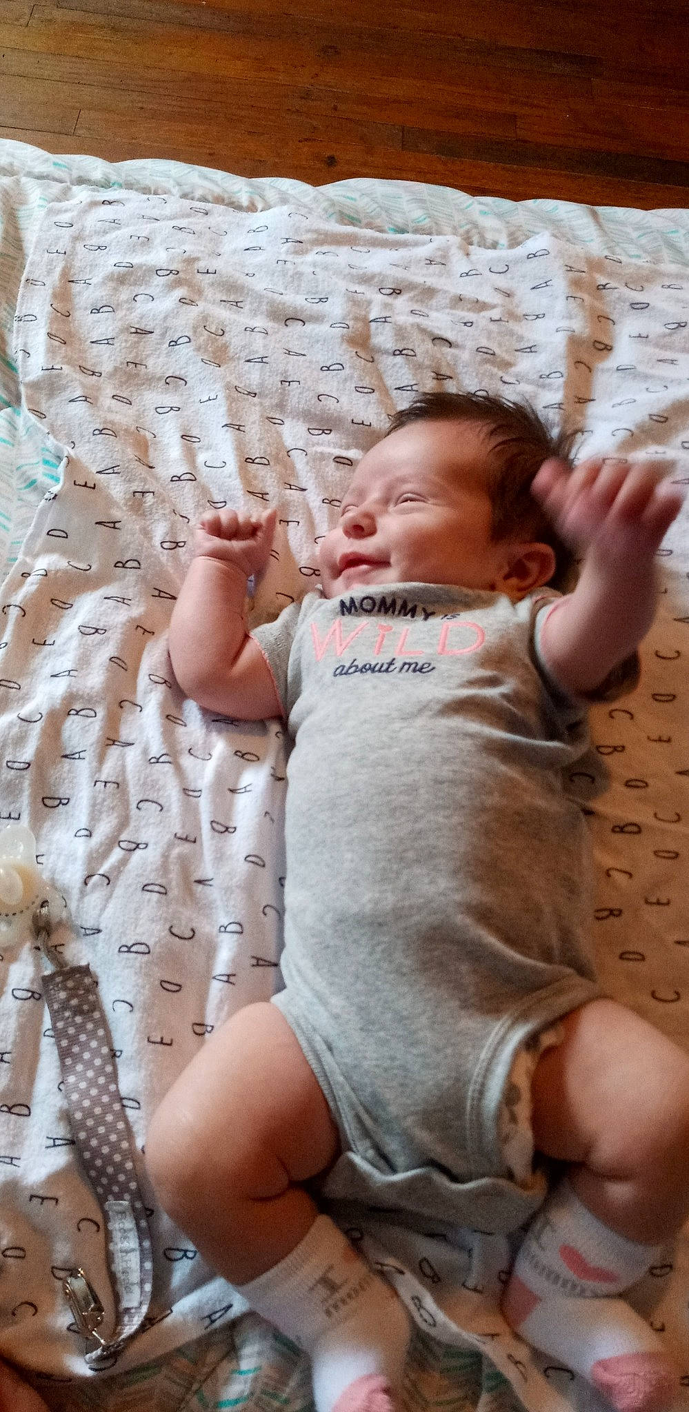 Shiloh is registered to the contest to win money with this photo: arm, baby, baby_toddler_clothing, cheek, comfort, eye, gesture, hand, human_body, joint, lip, mammal, mouth, muscle, person, product, shoulder, skin, sleeve, textile