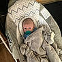 Dawson joined the competition — help win amazing prizes! baby, baby_rocker, blanket, child, comfort, cozy, cute, face, head, home, indoor, infant, looking, pacifier, person, resting, soft_texture, swaddled, wood_floor, young_child
