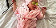 Michelle is registered to the contest to win money with this photo: baby, bed, compact, cucumber_slices, cute, headwear, infant, lying_down, makeup_brush, pampering, pink_robe, pink_towel, relaxation, rose, skin, sleeping, slippers, soft_texture, spa_theme, white_bed