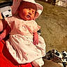 baby, infant, sleeping, yawning, pink_outfit, sun_hat, dress, blanket, portrait, face, closed_eyes, indoor, home, carpet, baby_gear, stroller, red_blanket, seated, cute, photography