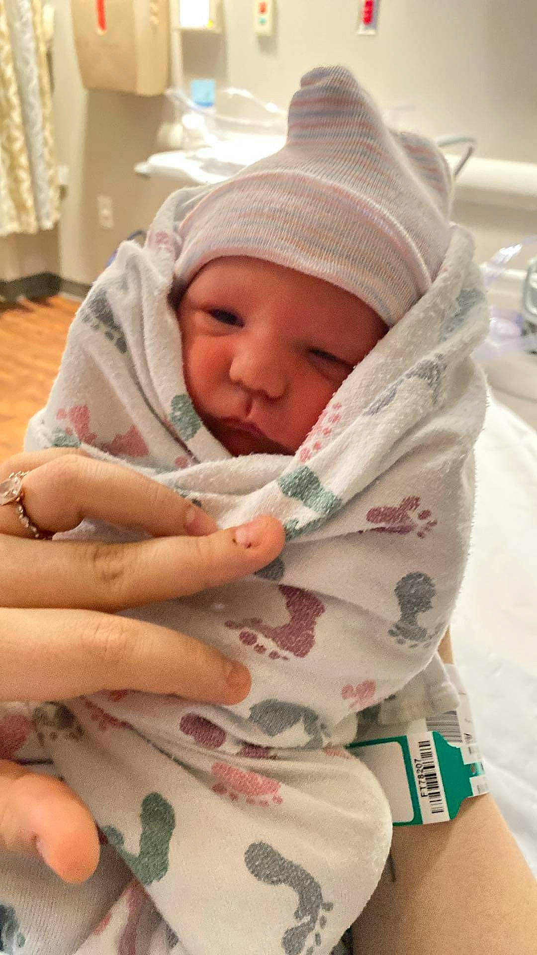 Logan is registered to the contest to win money with this photo: baby, baby_sleeping, baby_toddler_clothing, cap, cheek, child, comfort, finger, headwear, human_leg, knit_cap, linens, nail, people, person, skin, sleeve, textile, thigh, thumb