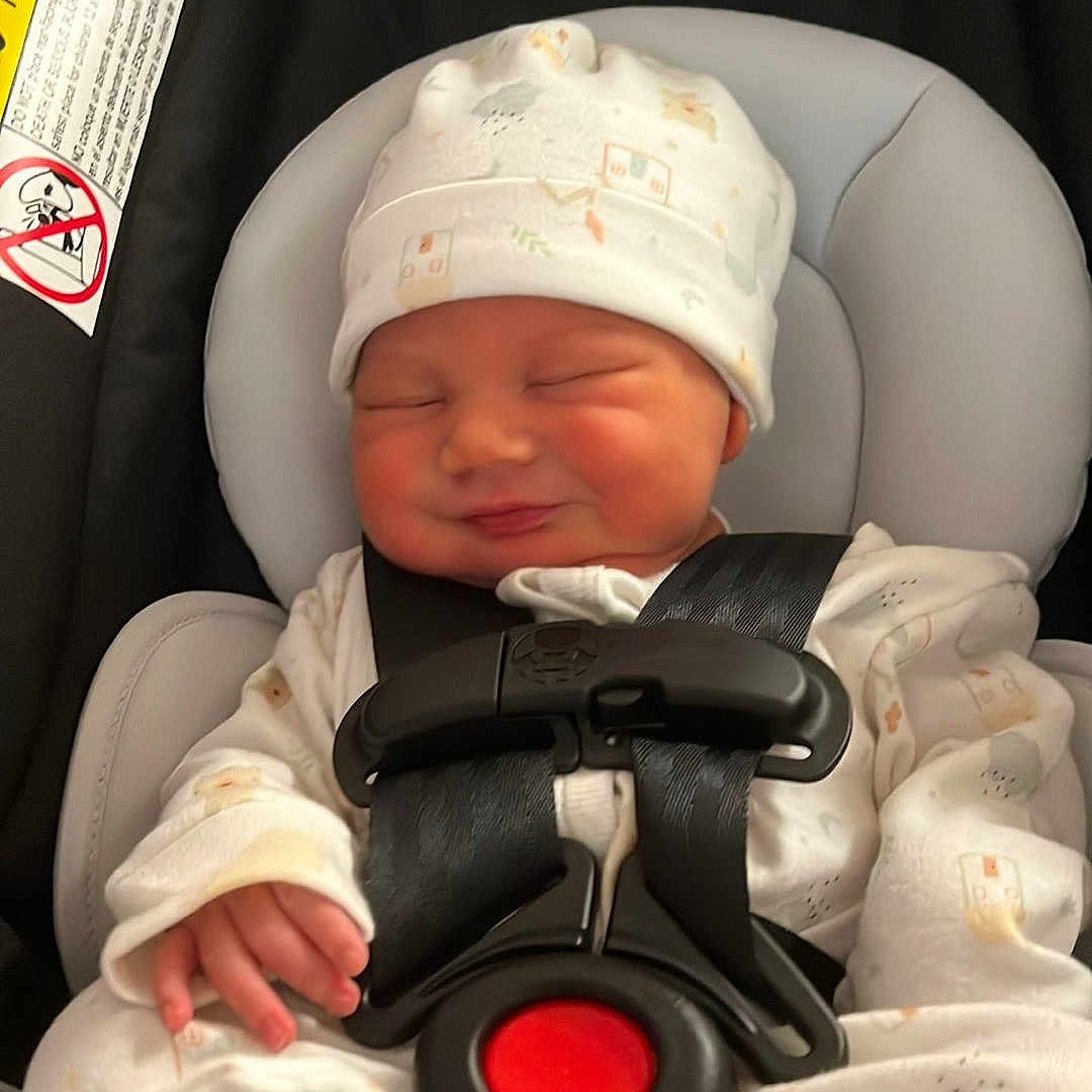 Angel joined the competition — help win amazing prizes! baby, cap, clothing, cushion, face, glove, gun, happy, hat, head, homedecor, newborn, person, photography, portrait, sleeping, smile, transportation, vehicle, weapon