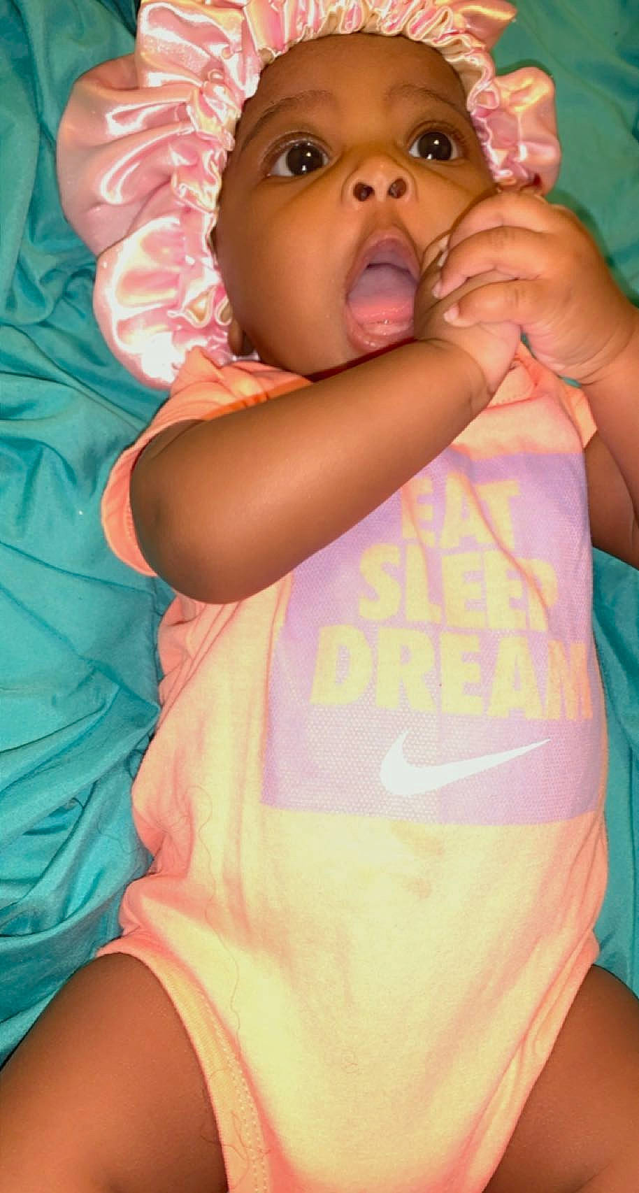 Anyla is registered to the contest to win money with this photo: active_tank, baby, baby_products, baby_toddler_clothing, bracelet, child, eyelash, nail, peach, person, pink, skin, throat, toddler