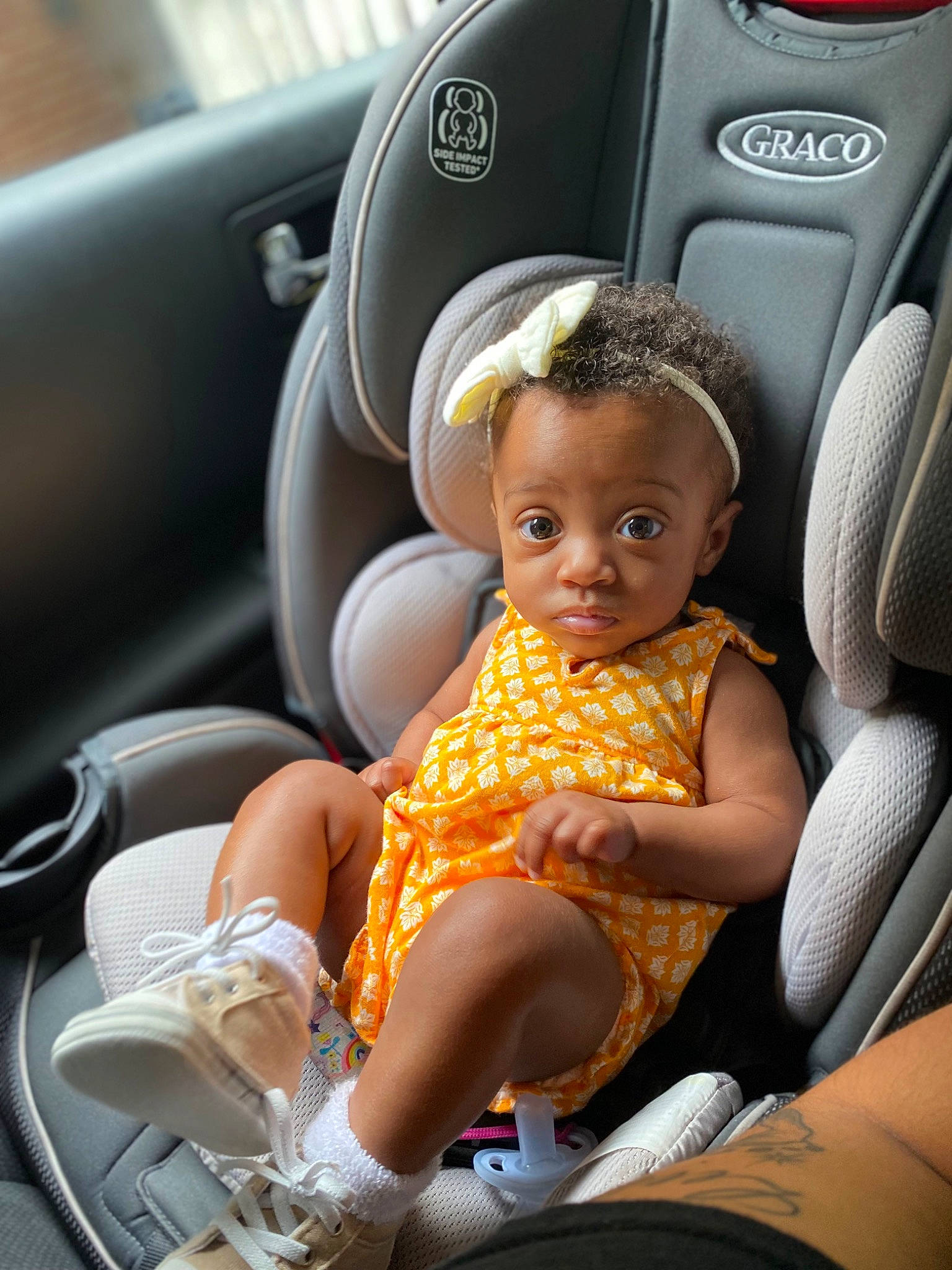 Karlee is registered to the contest to win money with this photo: auto_part, automotive_design, automotive_exterior, baby, baby_toddler_clothing, car, car_seat, car_seat_cover, child, comfort, family_car, head_restraint, lap, luxury_vehicle, motor_vehicle, person, personal_luxury_car, steering_part, steering_wheel, toddler