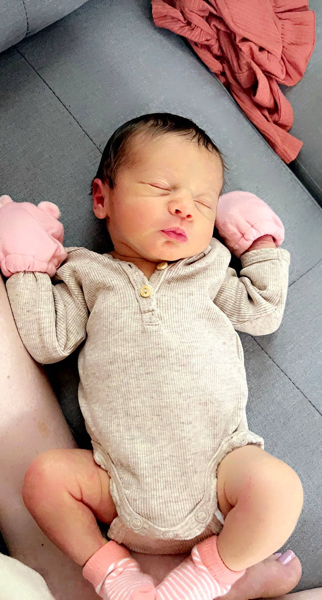 Lennon is registered to the contest to win money with this photo: arm, baby_toddler_clothing, cheek, chin, eye, face, facial_expression, hair, hairstyle, head, human_body, joint, leg, lip, mouth, neck, nose, person, shoulder, skin