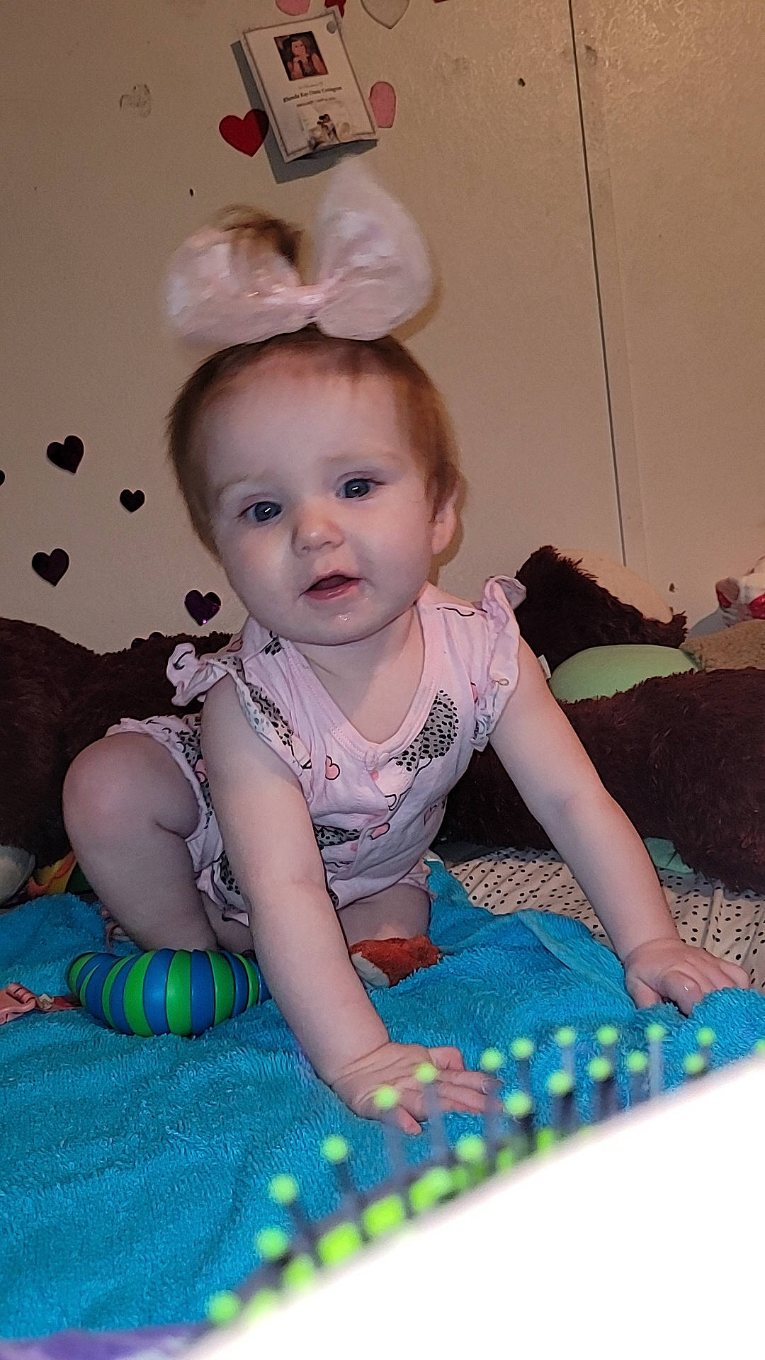 Jaylynn is registered to the contest to win money with this photo: baby, baby_products, baby_toddler_clothing, child, costume_hat, fashion_accessory, flooring, fun, grass, happy, hat, headpiece, iris, pattern, person, pink, room, sitting, skin, toddler