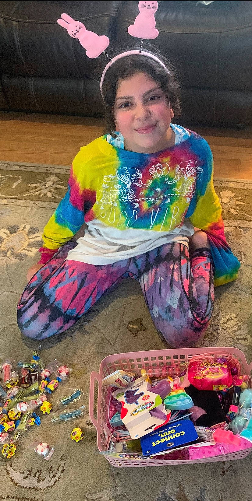 Khloe is registered to the contest to win money with this photo: blue, box, child, event, fun, happy, joy, magenta, pattern, person, photograph, plastic, selling, sitting, smile, snapshot