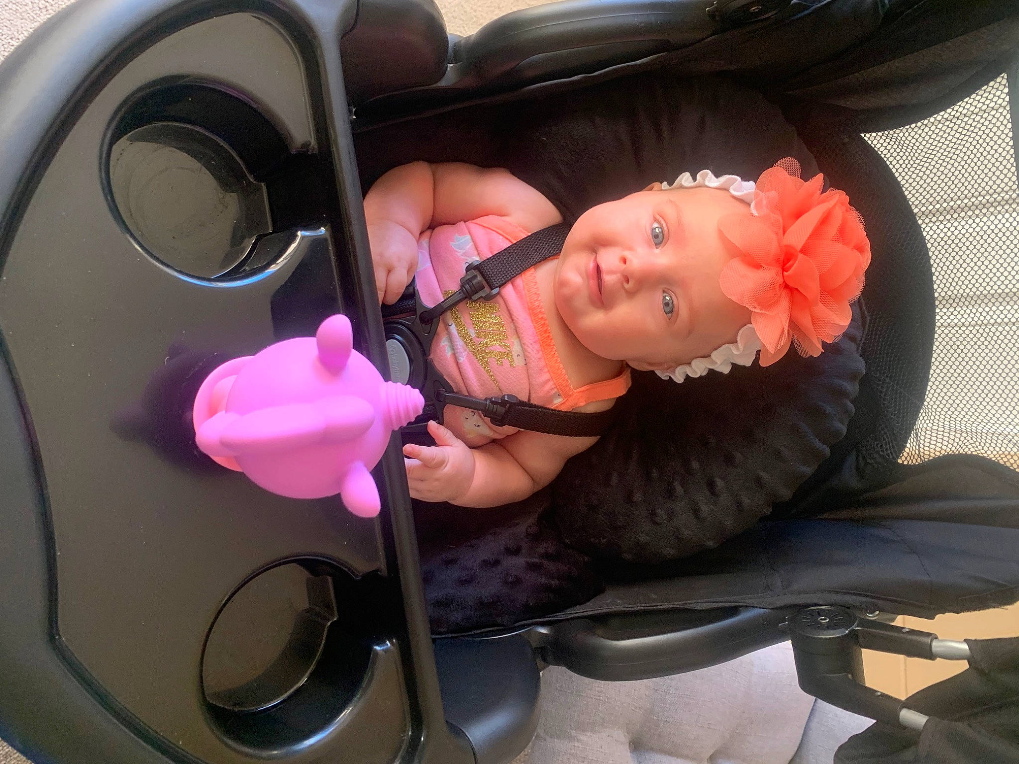 Klaire joined the competition — help win amazing prizes! audio_equipment, auto_part, automotive_exterior, baby_products, car_seat, car_seat_cover, doll, eyewear, family_car, fun, headgear, headwear, luxury_vehicle, magenta, motor_vehicle, nail, person, pink, room, smile