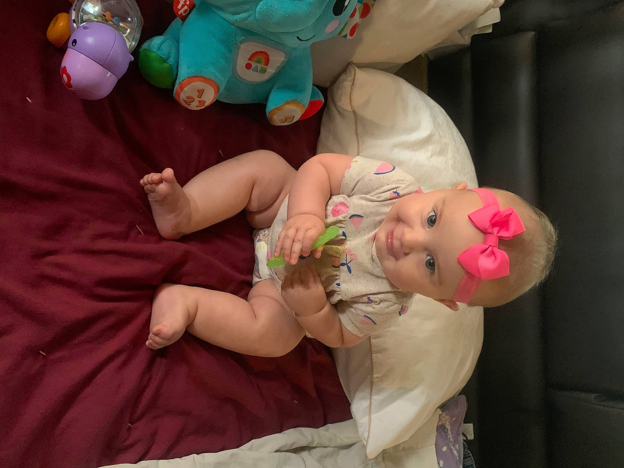 Klaire is registered to the contest to win money with this photo: baby, baby_products, baby_toddler_clothing, cheek, child, event, finger, fun, gesture, hand, happy, mouth, nail, person, pink, skin, smile, stuffed_toy, textile, toddler