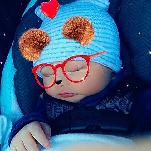 Carson is registered to the contest to win money with this photo: baby, cap, cool, electric_blue, eye, eyewear, fun, glasses, goggles, happy, hat, mouth, pattern, stuffed_toy, sunglasses, textile, toddler, toy, vertebrate, vision_care