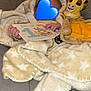 Emrys participe au concours pour gagner de l'argent avec cette photo : animal_character, baby, blanket, child, clothing, comfort, cushion, cute, hand, hooded_outfit, indoor, infant, lion_king, milestone_card, plush_toy, resting, soft_texture, star_pattern, stuffed_animal, toy