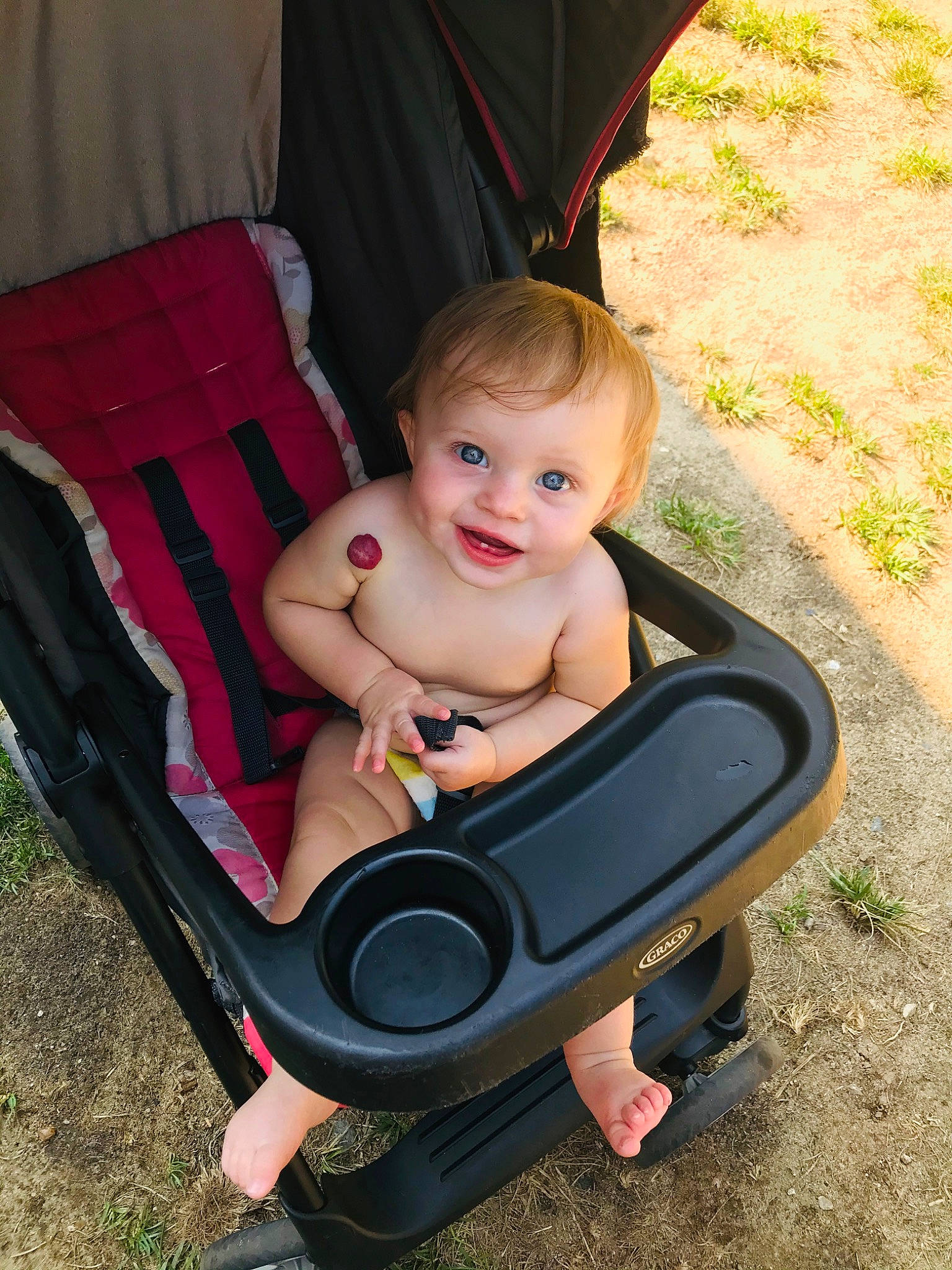 Lilyanna is registered to the contest to win money with this photo: auto_part, baby, baby_carriage, baby_products, child, leg, person, product, sitting, toddler, vacation