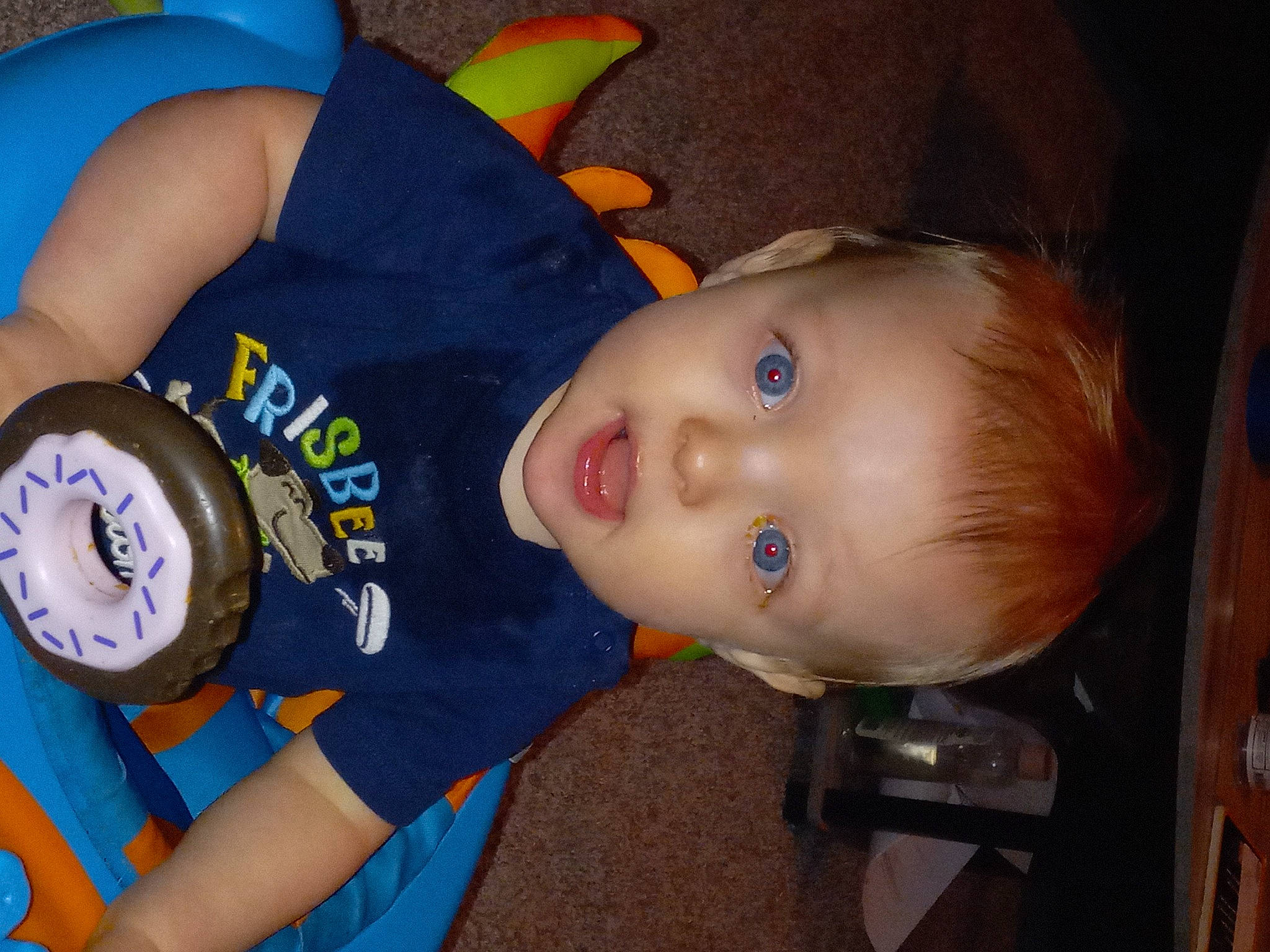 Skylar is registered to the contest to win money with this photo: baby, baby_products, baby_toddler_clothing, baby_toys, cheek, child, elbow, electric_blue, fun, happy, iris, person, play, sitting, sleeve, smile, t_shirt, toddler