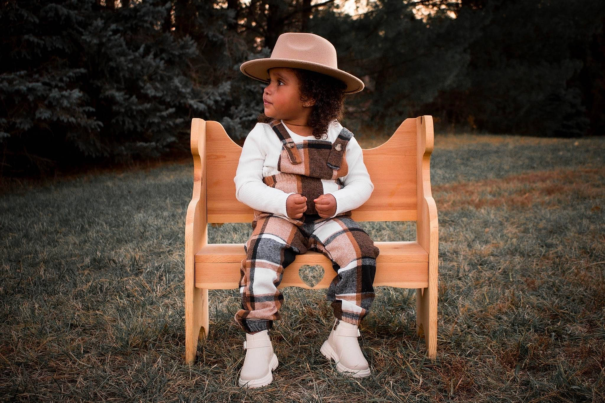 Wyatt joined the competition — help win amazing prizes! bench, fashion_accessory, fawn, fedora, flash_photography, formal_wear, grass, hat, headwear, human_body, human_leg, landscape, leisure, people_in_nature, person, plant, sitting, sock, soil, sun_hat