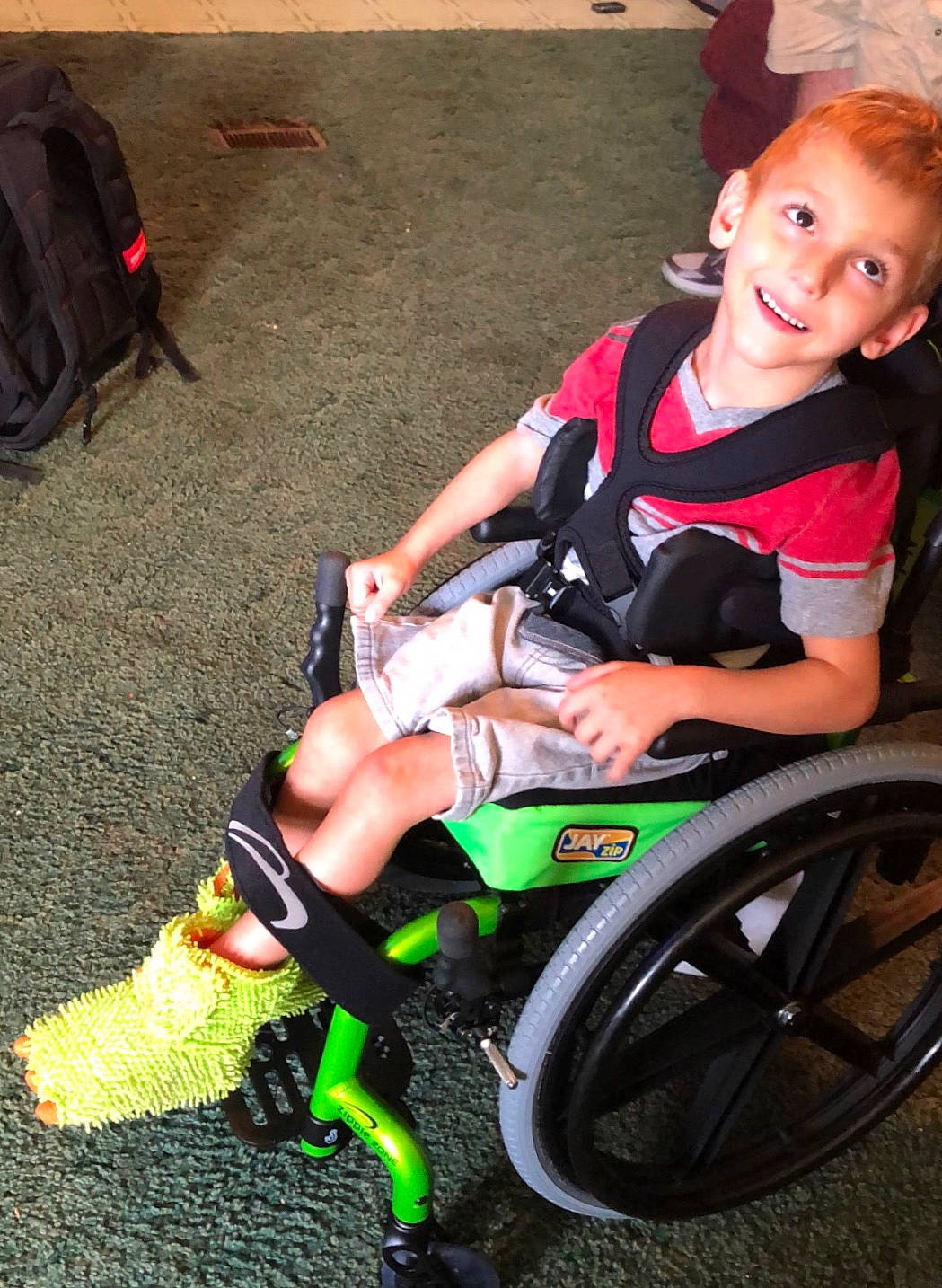 Ryder joined the competition — help win amazing prizes! baby_carriage, baby_products, bicycle_accessory, child, fun, girl, joy, lap, leg, person, personal_protective_equipment, product, recreation, wheelchair