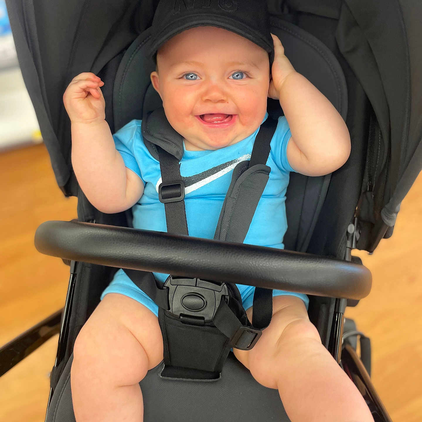 Kole joined the competition — help win amazing prizes! accessories, baby, baseballcap, cap, clothing, coat, face, happy, hat, head, helmet, jacket, pants, person, photography, portrait, smile, strap, stroller, t_shirt