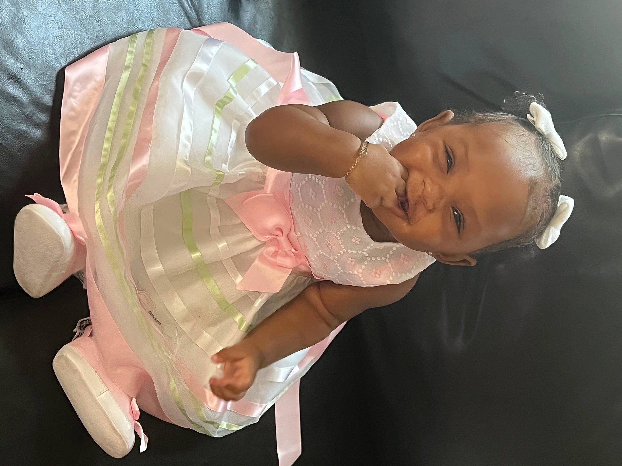 Faith is registered to the contest to win money with this photo: abdomen, baby, baby_products, baby_toddler_clothing, cheek, chest, child, ear, elbow, event, facial_expression, flash_photography, fun, happy, hat, mouth, person, skin, sleeve, smile