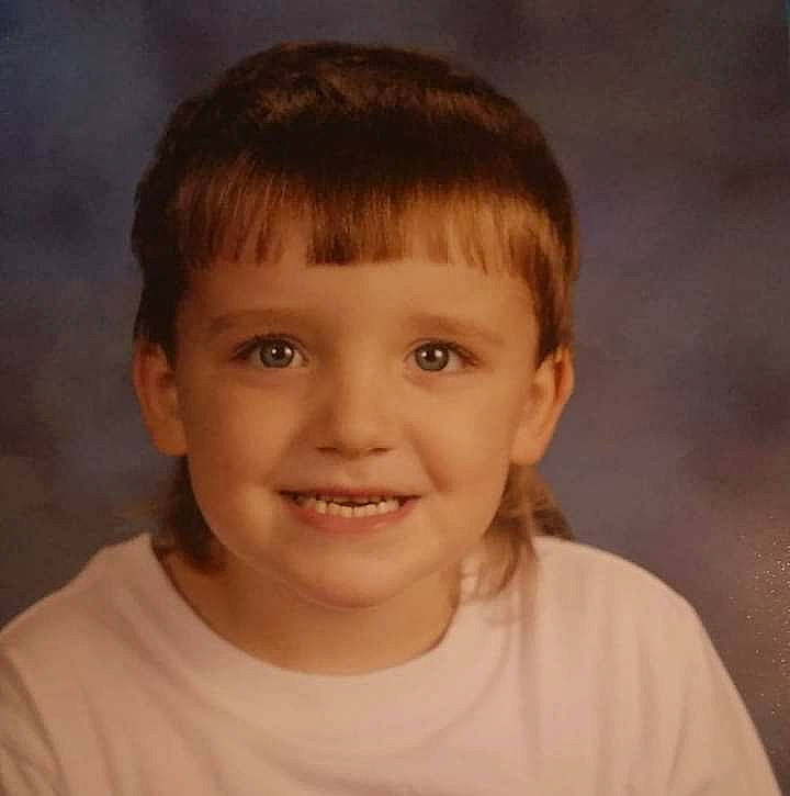 Caleb is registered to the contest to win money with this photo: bangs, brown_hair, cheek, chin, ear, eyelash, flash_photography, forehead, fun, hair, happy, iris, jaw, joy, lip, neck, nose, person, smile, t_shirt