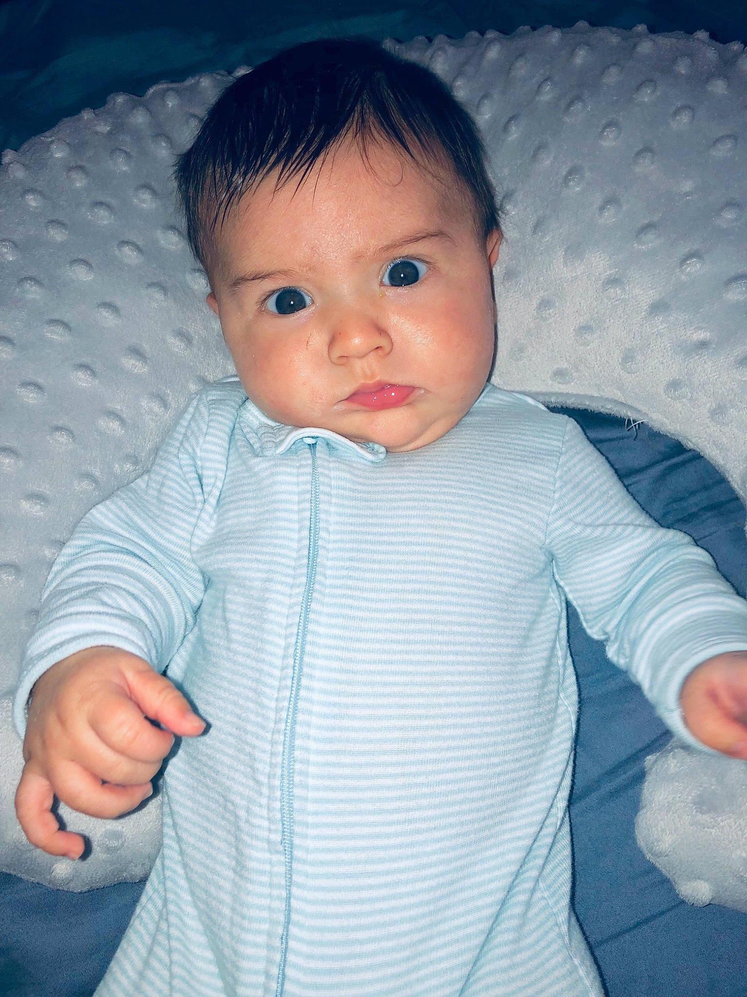 Clifford is registered to the contest to win money with this photo: baby, cheek, child, eye, face, finger, hand, head, iris, person, skin, smile, standing, toddler