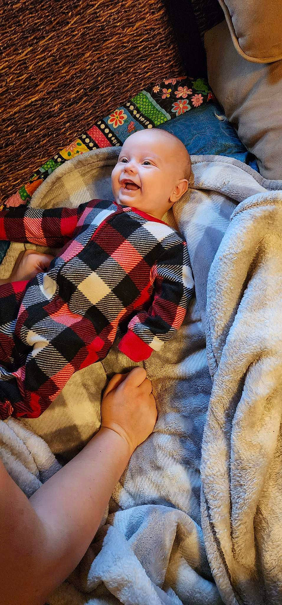 Braxton joined the competition — help win amazing prizes! baby, baby_toddler_clothing, bedtime, child, comfort, eye, fun, grass, happy, linens, pattern, person, plaid, room, sitting, skin, smile, tartan, textile, toddler