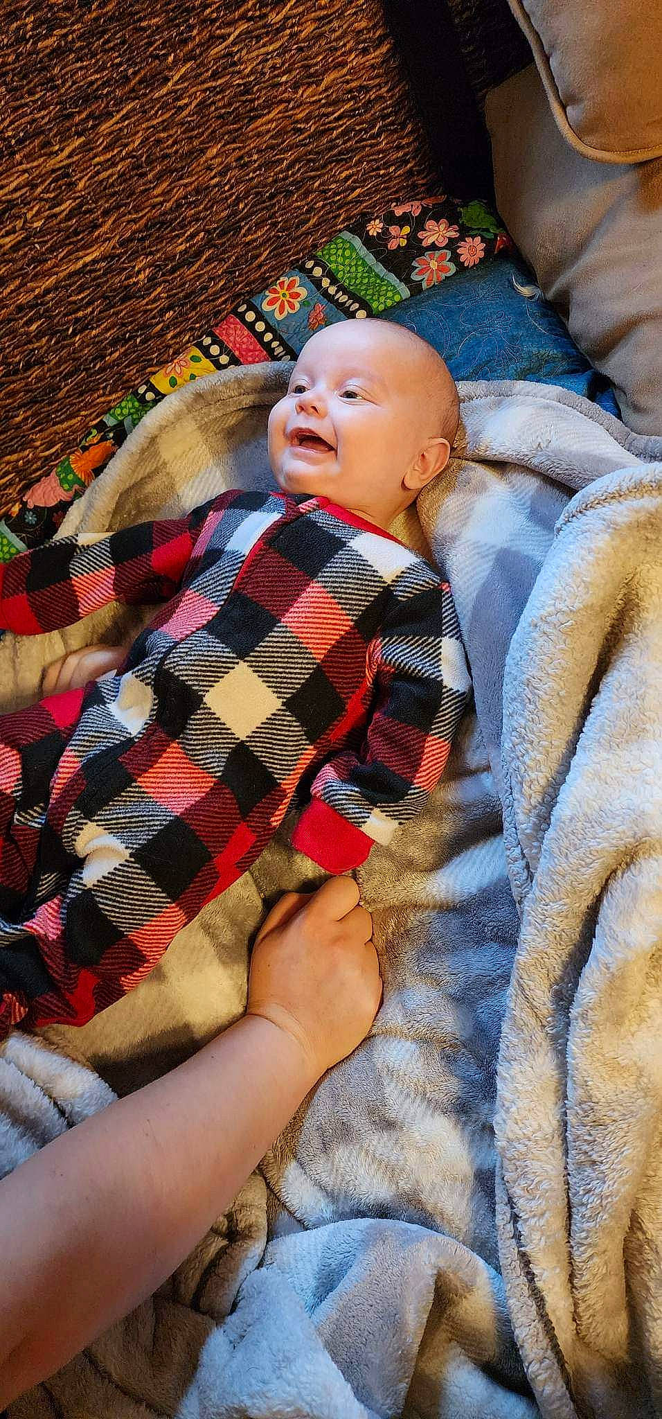 Braxton is registered to the contest to win money with this photo: baby, baby_products, baby_toddler_clothing, bedtime, child, comfort, fun, lap, linens, nail, nap, pattern, person, plaid, product, sitting, skin, tartan, thigh, toddler