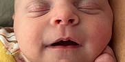 Oaklee is registered to the contest to win money with this photo: baby, sleeping, infant, face, hand, skin, clothing, pattern, closeup, peaceful, newborn, rest, soft, blanket, cute, portrait, child, young, calm, indoors