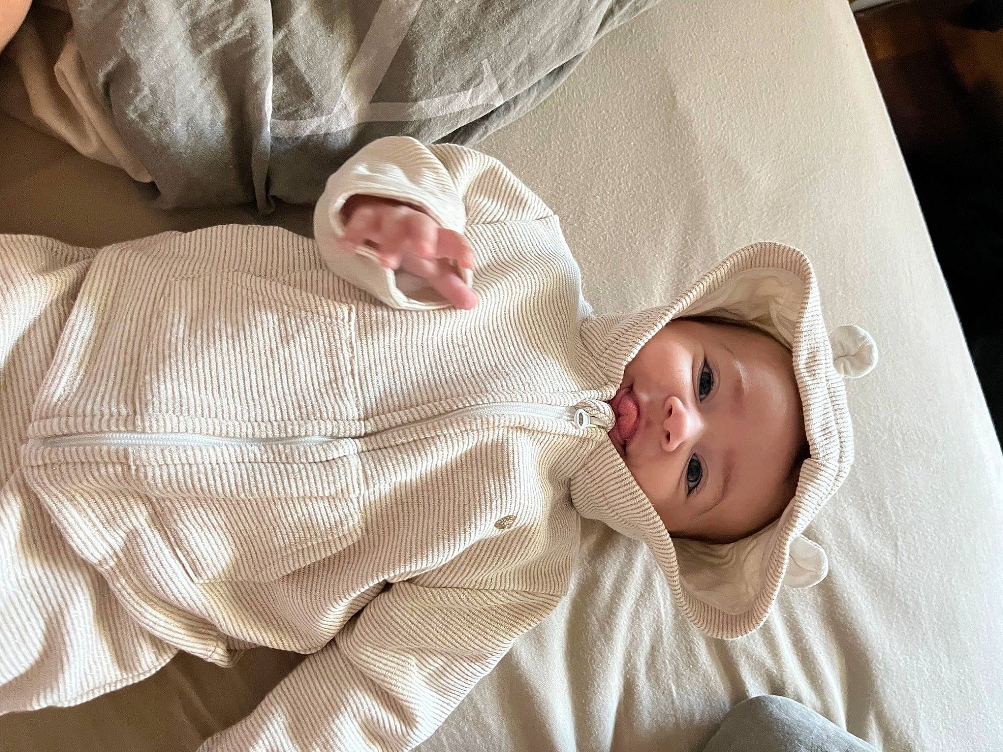 Elena participe au concours pour gagner de l'argent avec cette photo : baby, baby_products, baby_toddler_clothing, bedding, bedtime, child, comfort, event, hat, linens, nap, pattern, person, portrait_photography, room, skin, sleep, sleeve, smile, toddler