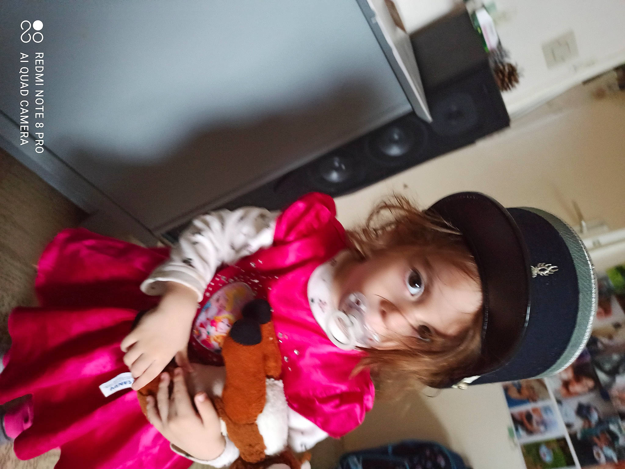 Yrina participe au concours pour gagner de l'argent avec cette photo : audio_equipment, baby, child, comfort, costume, fashion_accessory, flash_photography, fun, happy, hat, home_appliance, magenta, person, room, sleeve, smile, suit, toddler