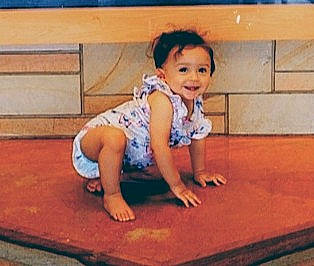 Mae'Leigh joined the competition — help win amazing prizes! arm, baby, child, child_model, crawling, floor, flooring, joy, leg, person, play, sitting, smile, toddler