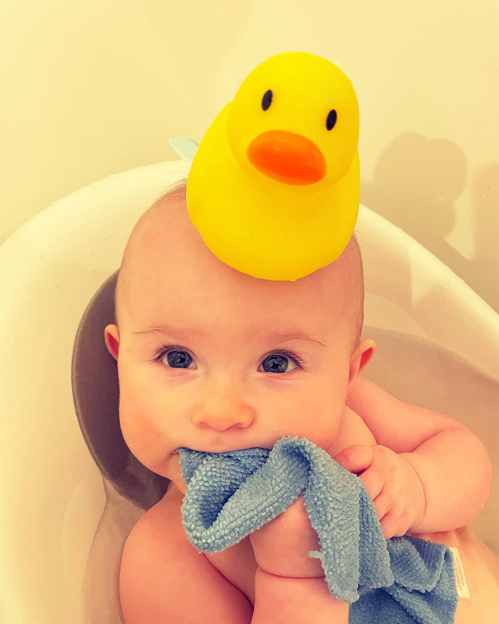 Fiona joined the competition — help win amazing prizes! _geese_and_swans, baby, baby_bathing, baby_products, baby_toddler_clothing, baby_toys, bath_toy, bathing, bird, cheek, ducks, electric_blue, fluid, headwear, nail, organ, person, product, rubber_ducky, thumb