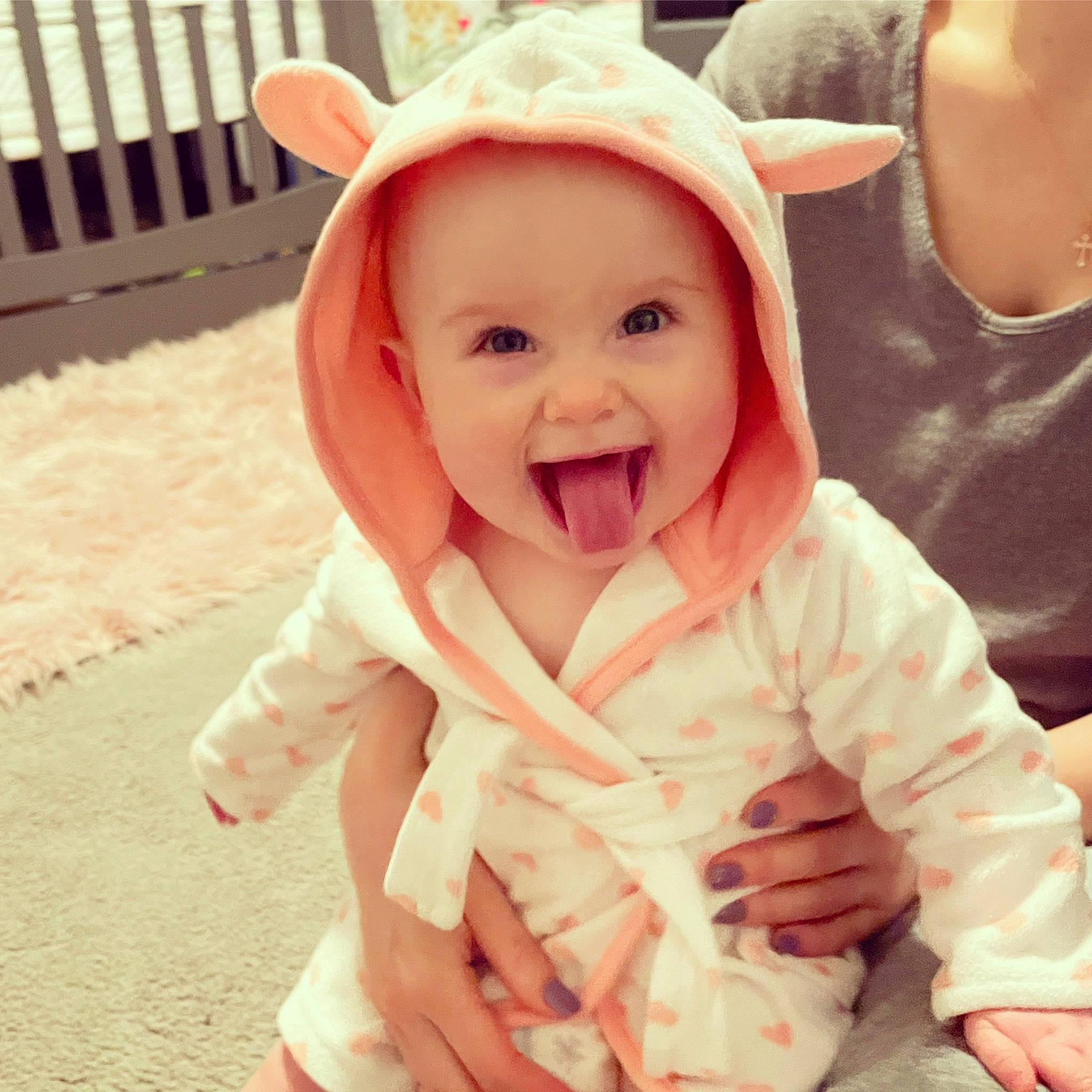 Fiona joined the competition — help win amazing prizes! baby, baby_laughing, baby_making_funny_faces, baby_toddler_clothing, cheek, child, comfort, facial_expression, finger, fun, gesture, happy, headwear, lip, person, pink, skin, sleeve, smile, thumb