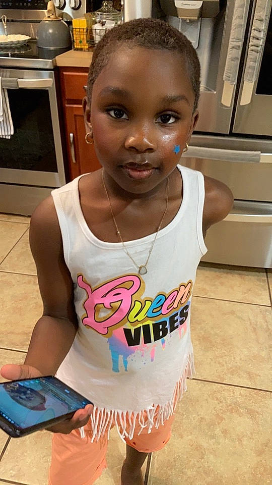 Milyn joined the competition — help win amazing prizes! active_tank, arm, black_hair, chest, chin, cool, face, forehead, hairstyle, happy, head, human_body, joint, kitchen_appliance, muscle, person, shoulder, skin, sleeve, t_shirt