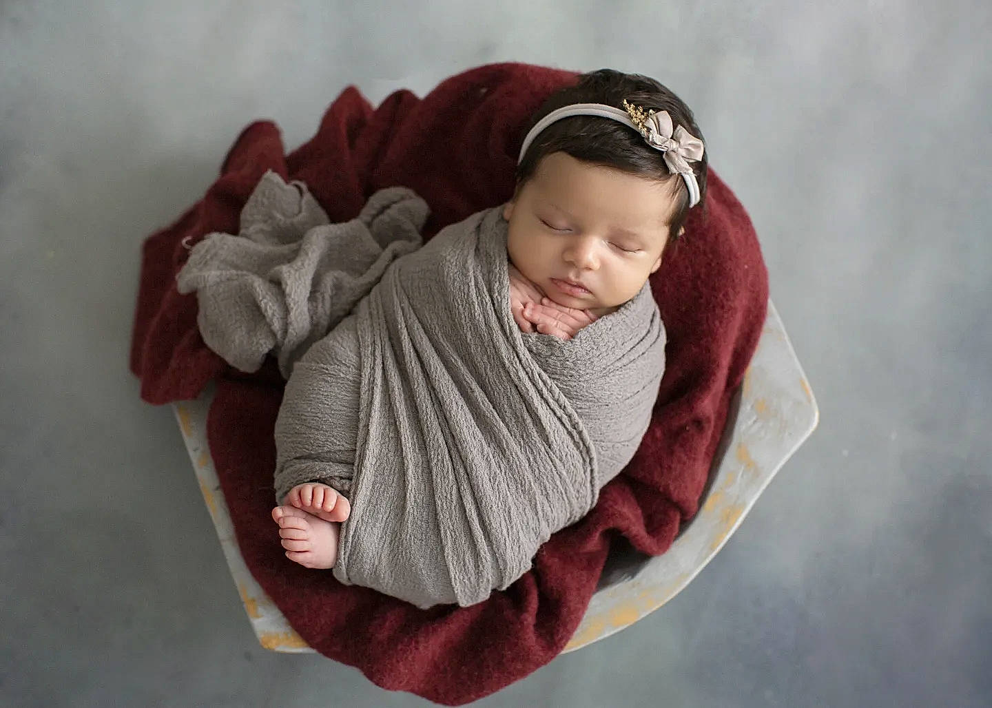 Scarlett joined the competition — help win amazing prizes! arm, baby, baby_products, baby_sleeping, baby_toddler_clothing, cap, cloud, comfort, face, gesture, happy, headgear, headwear, human_body, knit_cap, person, sleeve, toddler, winter, wood
