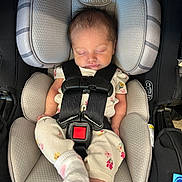 Saylor joined the competition — help win amazing prizes! baby, newborn, car_seat, graco, sleeping, infant, child, seatbelt, clothing, pajamas, sock, rest, safety, transportation, head_support, cute, peaceful, indoors, person, seat
