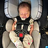 baby, newborn, car_seat, graco, sleeping, infant, child, seatbelt, clothing, pajamas, sock, rest, safety, transportation, head_support, cute, peaceful, indoors, person, seat