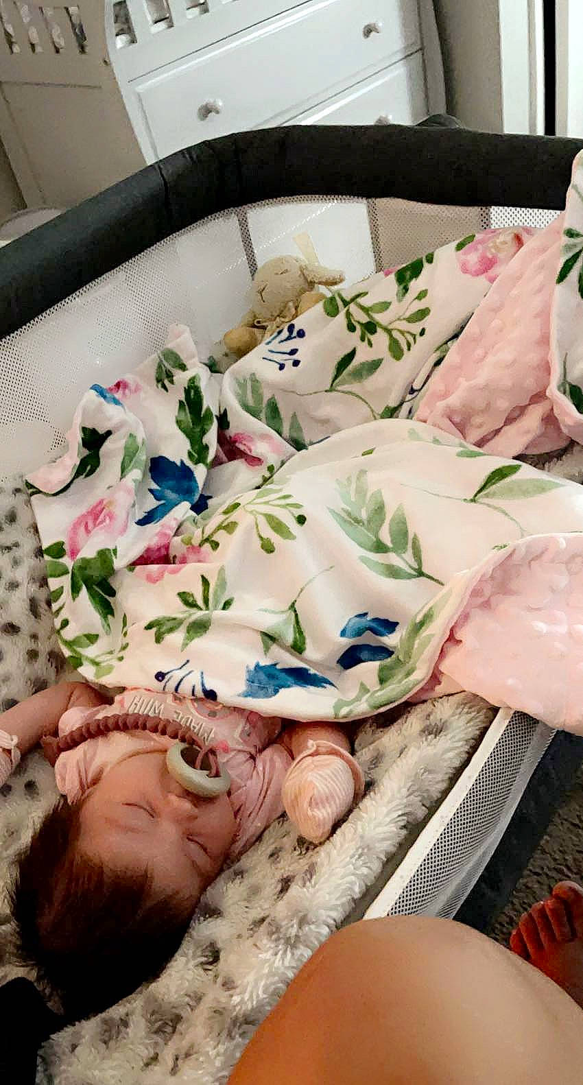 Alana is registered to the contest to win money with this photo: art, baby, baby_toddler_clothing, bedding, bedtime, child, comfort, flesh, happy, linens, nap, nightwear, pattern, person, pink, room, sleep, sleeve, smile, textile