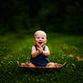 baby, basket, child, childhood, clapping, cute, daylight, grass, greenery, happy, infant, nature, one_person, outdoor, people, playful, portrait, sitting, smiling, summer