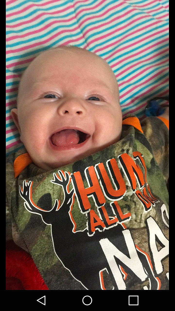 Jesse joined the competition — help win amazing prizes! baby, cheek, child, cool, face, facial_expression, head, laugh, mouth, nose, person, photo_caption, smile, t_shirt, toddler