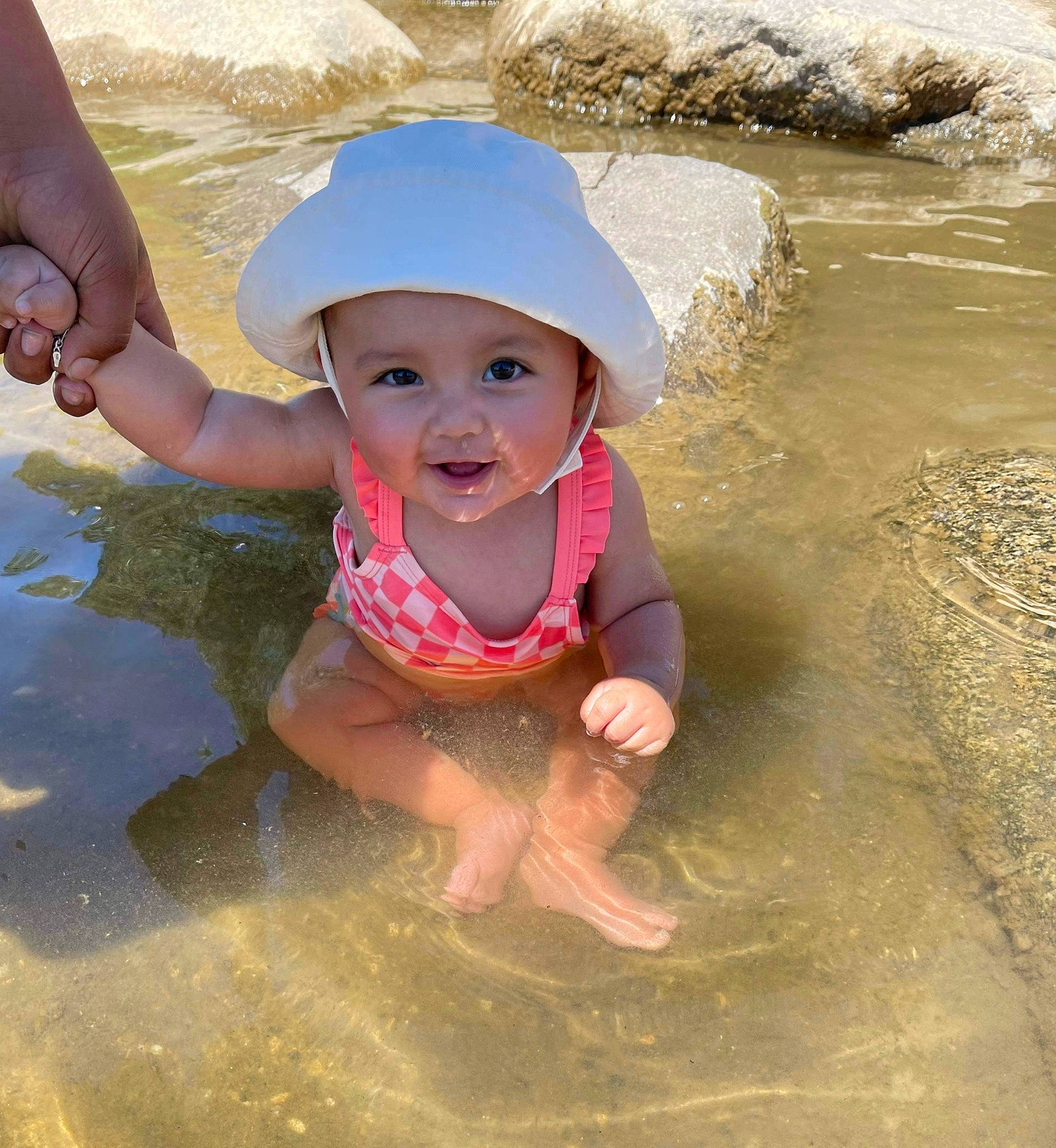 Layla joined the competition — help win amazing prizes! baby, baby_toddler_clothing, beach, cap, child, face, fun, happy, headwear, leisure, people_in_nature, people_on_beach, person, personal_protective_equipment, recreation, sand, smile, summer, toddler, vacation