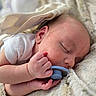 Gunner is registered to the contest to win money with this photo: baby, sleeping, pacifier, blanket, infant, closeup, soft, cozy, skin, hand, peaceful, rest, child, newborn, comfort, indoors, cute, relaxed, portrait, toddler