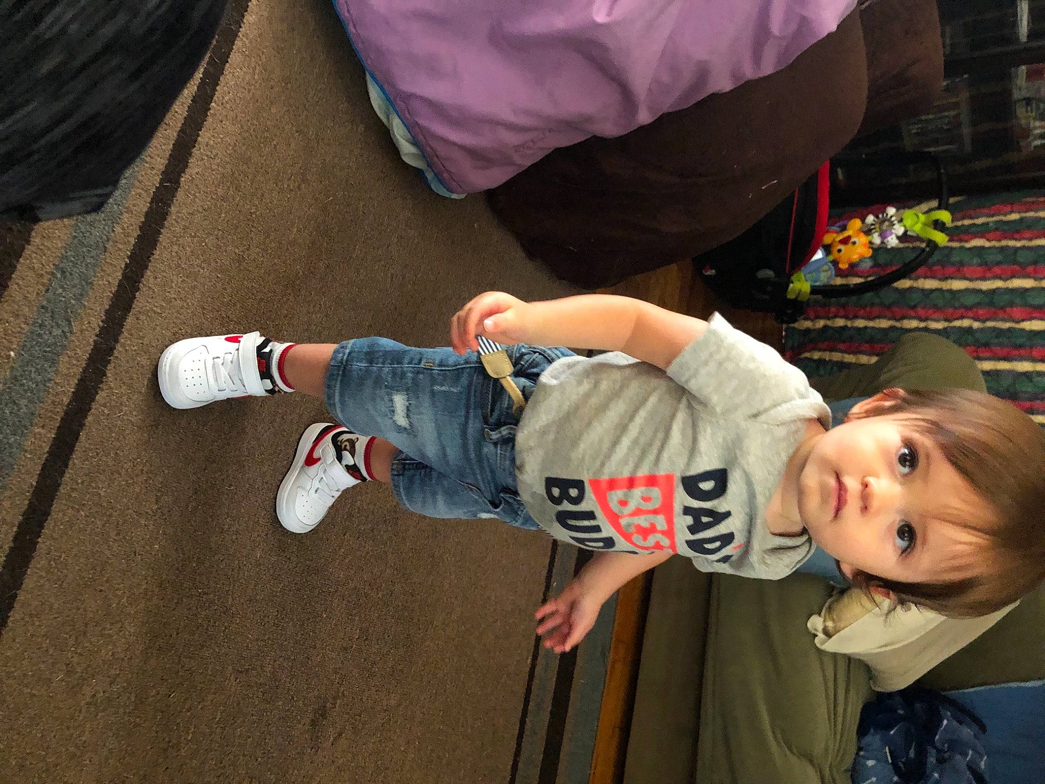 Kenny is registered to the contest to win money with this photo: baby, child, elbow, fun, happy, hat, human_leg, joint, knee, leg, leisure, outdoor_shoe, person, sitting, sleeve, smile, sneakers, sock, t_shirt, toddler