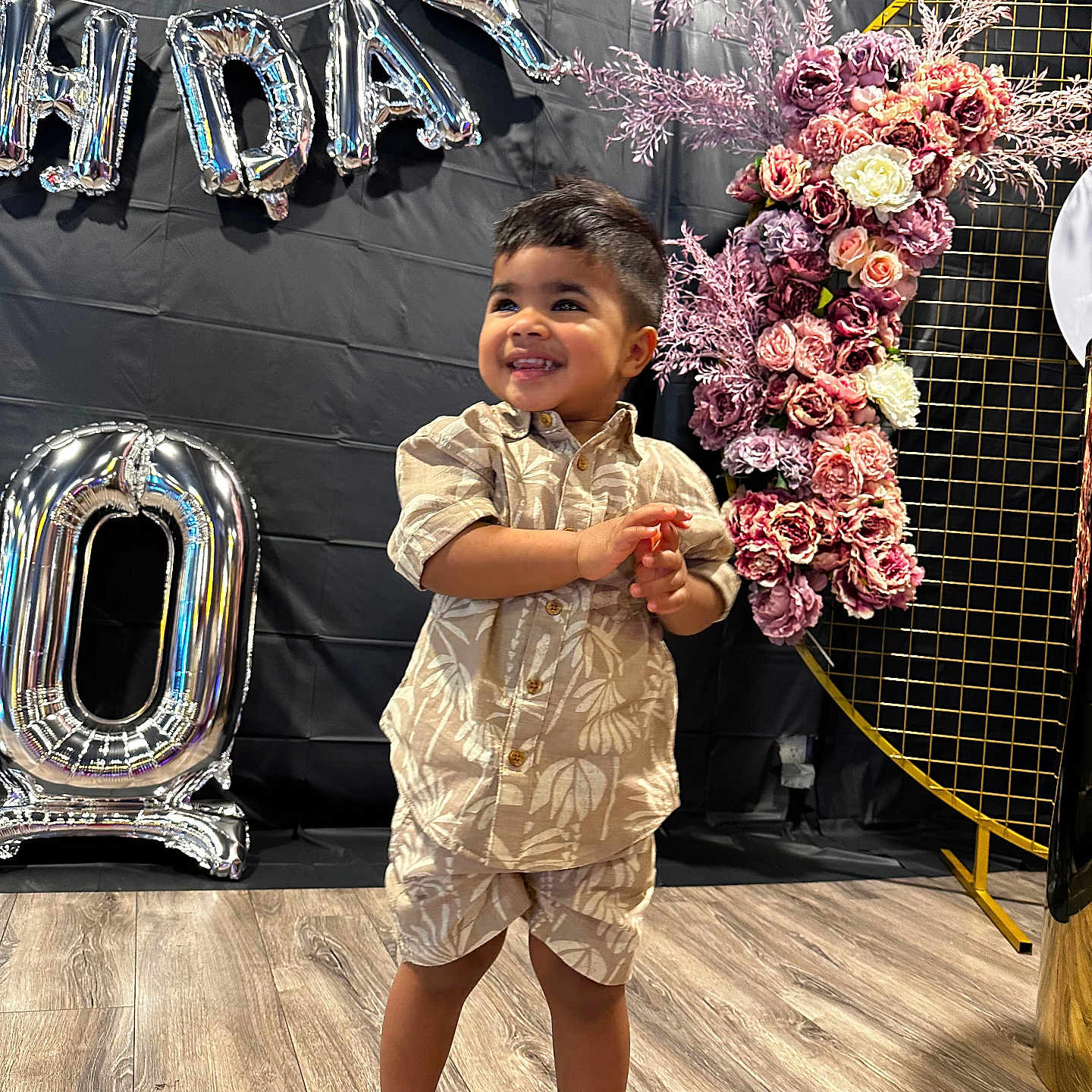 Grayson is registered to the contest to win money with this photo: accessories, boy, child, clothing, dress, face, flower, flowerarrangement, flowerbouquet, footwear, head, male, person, photography, plant, portrait, sandal, shoe, shorts, sleeve